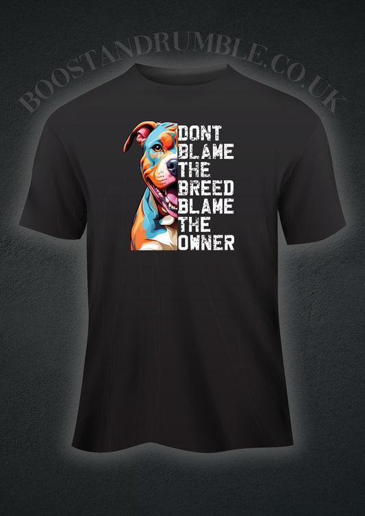 Vibrant and powerful XL Bully Dog T-shirt featuring a bold and colorful portrayal of an XL Bully, celebrating their beauty and strength. The shirt carries the empowering message 'Don't Blame The Breed,' challenging stereotypes and promoting understanding